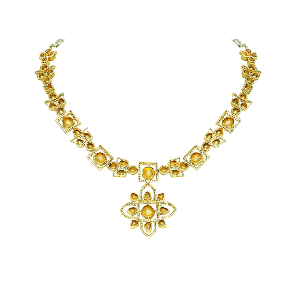 Polki Necklace with Floral Motifs and Lotus-Inspired Pendant